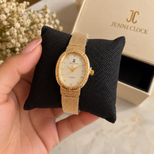 Montre femme dorée ovale avec bracelet maille