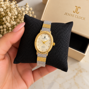 Montre femme ovale bicolore dorée et argentée